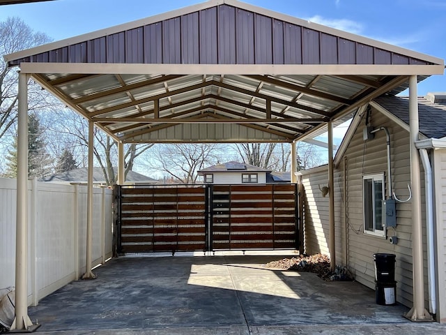 view of patio featuring a gate and fence