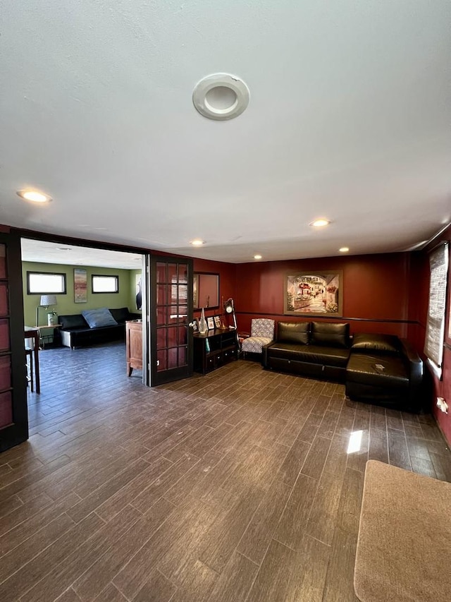 unfurnished living room featuring recessed lighting and wood finished floors