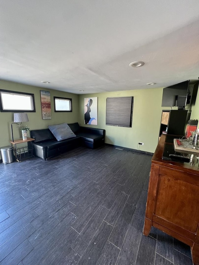 living room featuring dark wood-type flooring