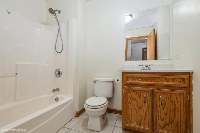 full bathroom with tile patterned flooring, toilet, shower / bath combination, vanity, and baseboards