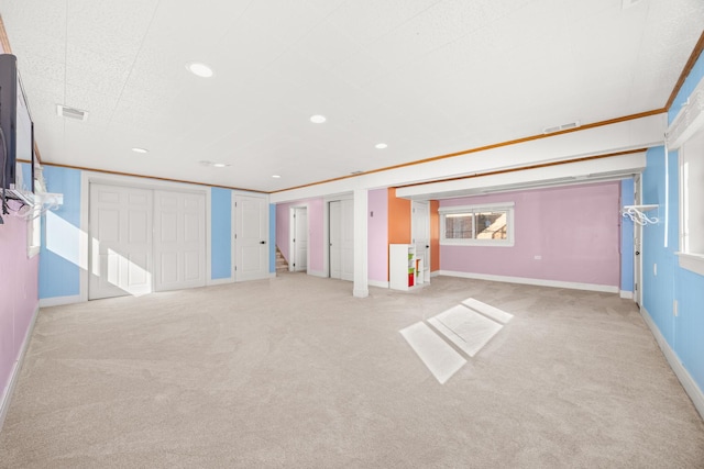 interior space featuring carpet floors, recessed lighting, visible vents, and baseboards