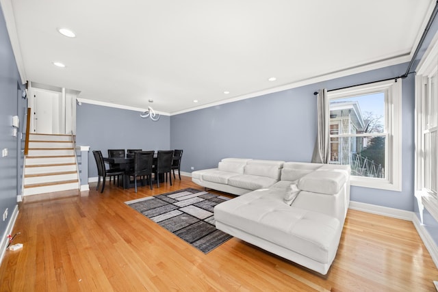 living area with recessed lighting, stairway, ornamental molding, wood finished floors, and baseboards