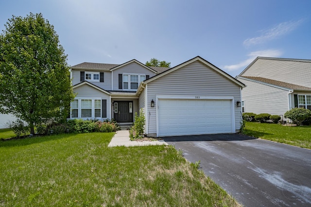 view of front of home with a garage, a front lawn, and aphalt driveway