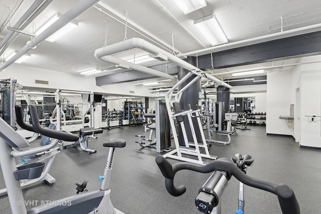 exercise room featuring visible vents