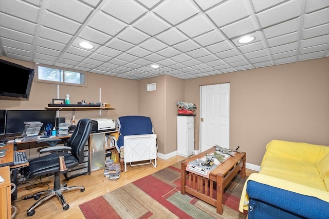 office with baseboards, wood finished floors, and recessed lighting