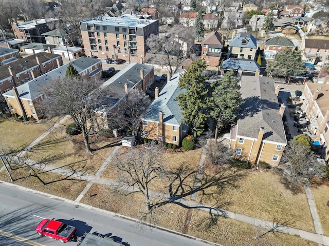 birds eye view of property with a residential view