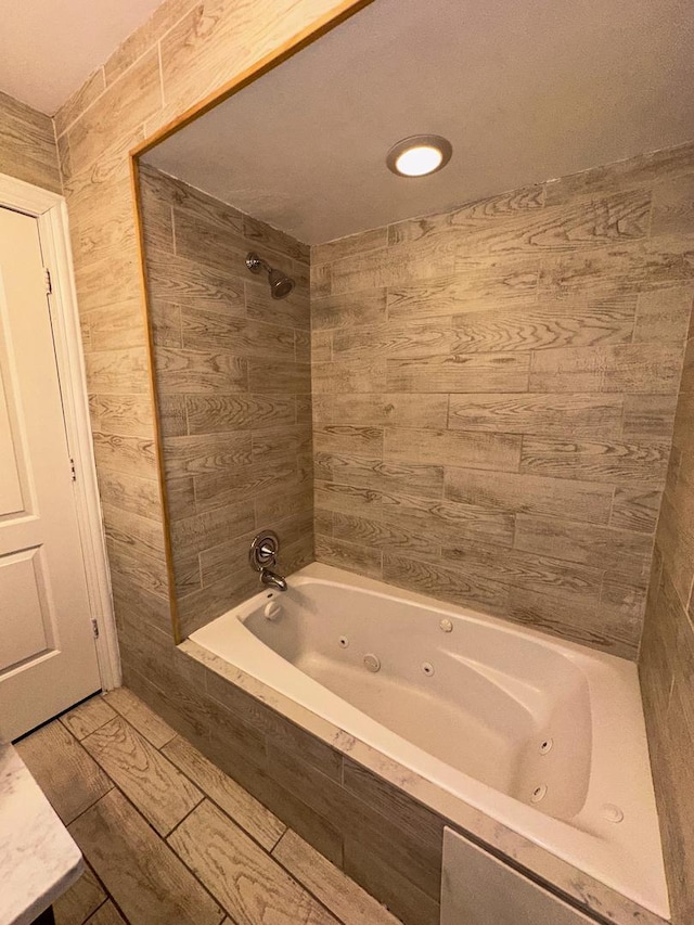 full bathroom featuring a combined bath / shower with jetted tub