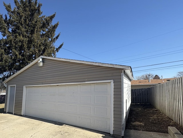 detached garage with fence