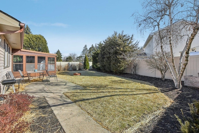 view of yard featuring a fenced backyard and a patio area