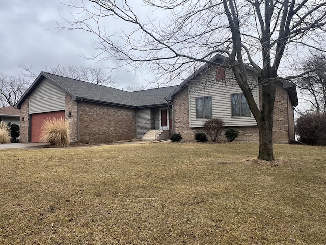 view of front of house featuring an attached garage, a shingled roof, a front lawn, and brick siding