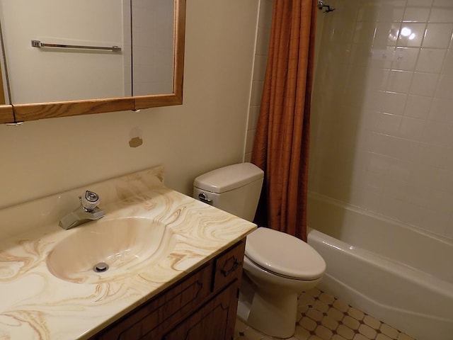 bathroom with toilet, shower / tub combo with curtain, and vanity