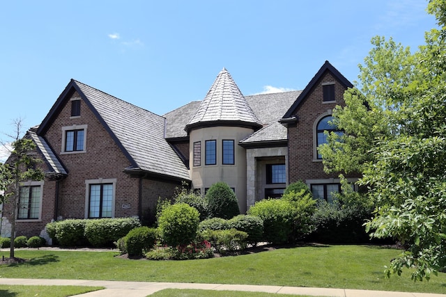 1860 Lake Charles Dr, Vernon Hills, IL 60061 - view of front of house featuring brick siding and a front yard