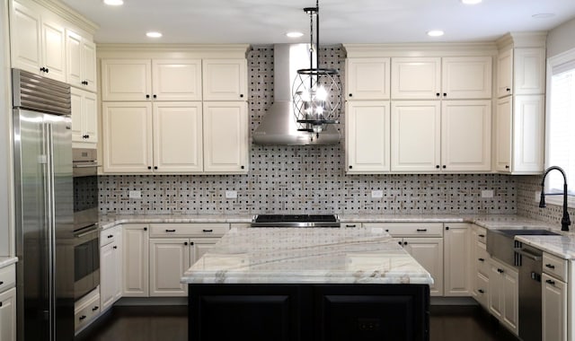 1860 Lake Charles Dr, Vernon Hills, IL 60061 - kitchen with stainless steel appliances, backsplash, wall chimney range hood, pendant lighting, and light stone countertops
