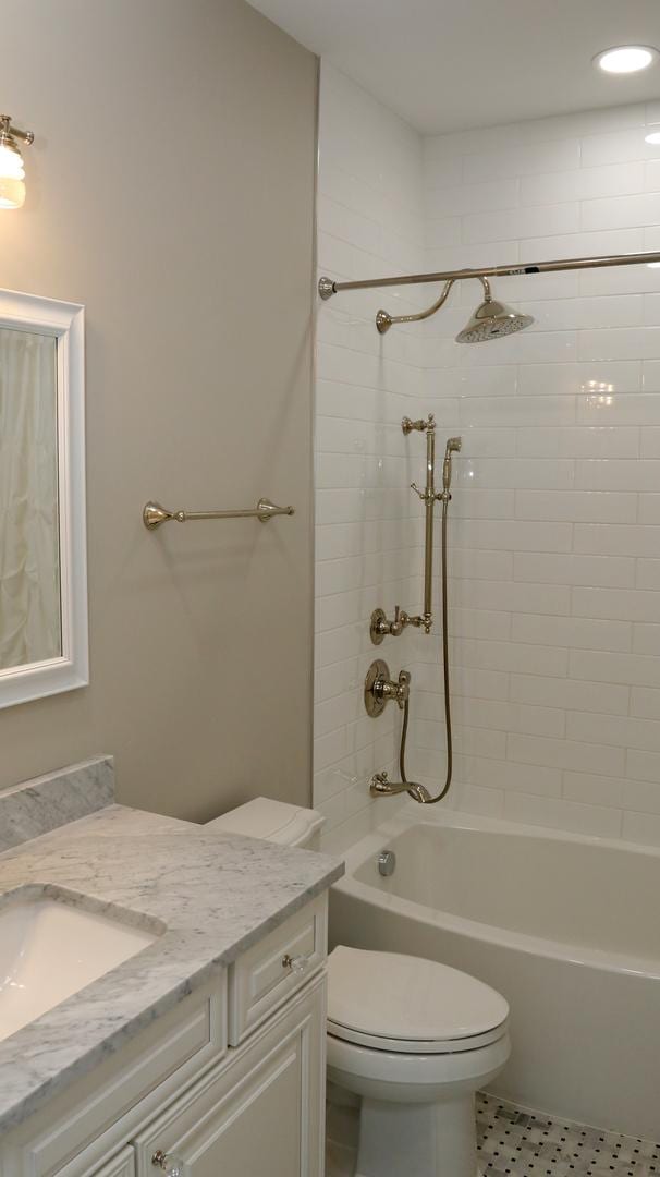 1860 Lake Charles Dr, Vernon Hills, IL 60061 - bathroom featuring vanity, bathing tub / shower combination, tile patterned floors, and recessed lighting
