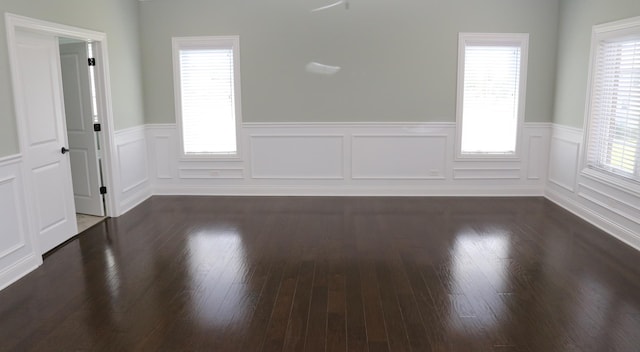 1860 Lake Charles Dr, Vernon Hills, IL 60061 - spare room featuring wainscoting and wood finished floors