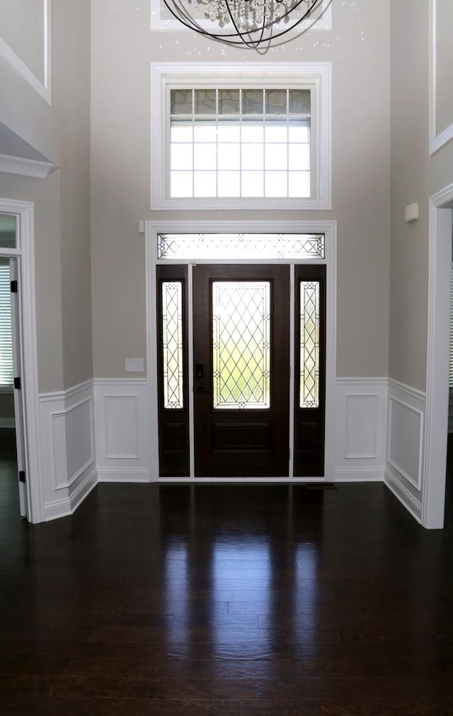 1860 Lake Charles Dr, Vernon Hills, IL 60061 - foyer entrance with wainscoting, a decorative wall, and wood finished floors
