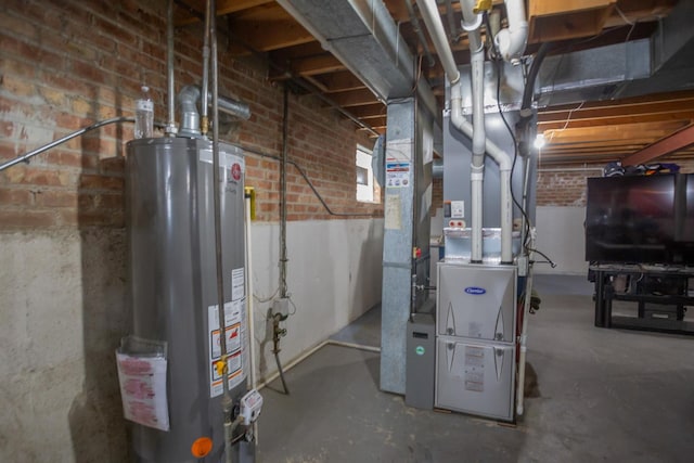 utility room featuring heating unit and water heater