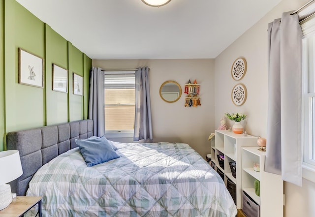 bedroom featuring a baseboard heating unit