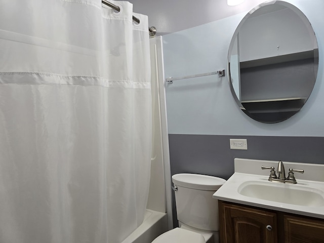 full bath with toilet, shower / bathtub combination with curtain, and vanity