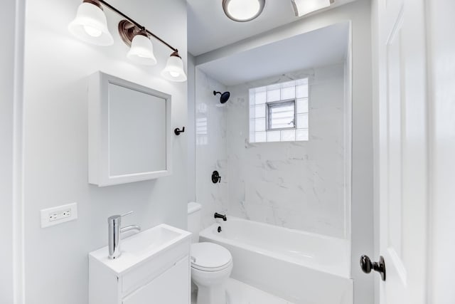 bathroom featuring vanity, toilet, and shower / bath combination