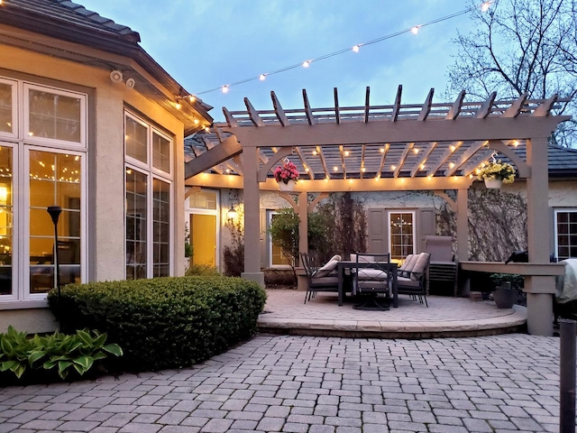 view of patio featuring a pergola