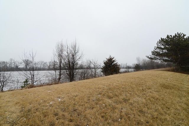 view of yard with a water view