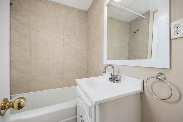 bathroom featuring vanity and shower / bath combination