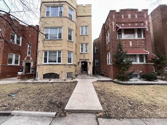 view of property with central air condition unit