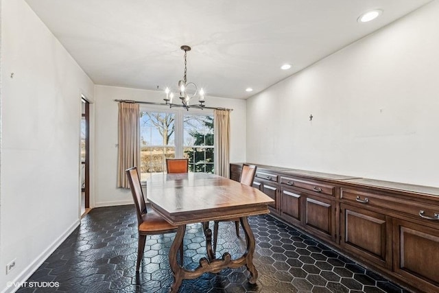 dining area featuring a notable chandelier, recessed lighting, and baseboards