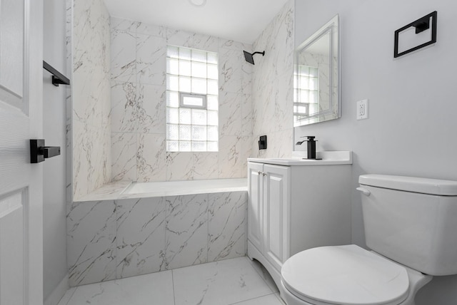 full bathroom featuring marble finish floor, vanity, toilet, and walk in shower