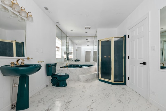 bathroom with marble finish floor, visible vents, a shower stall, and a bath