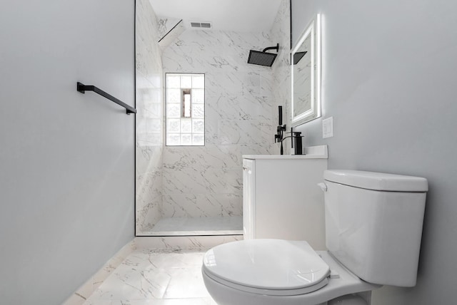 full bathroom featuring toilet, marble finish floor, and a marble finish shower