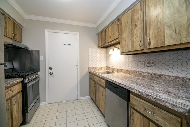 kitchen featuring under cabinet range hood, stainless steel appliances, ornamental molding, and a sink