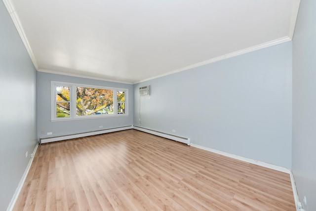 spare room featuring baseboards, light wood finished floors, a baseboard radiator, a wall mounted air conditioner, and crown molding