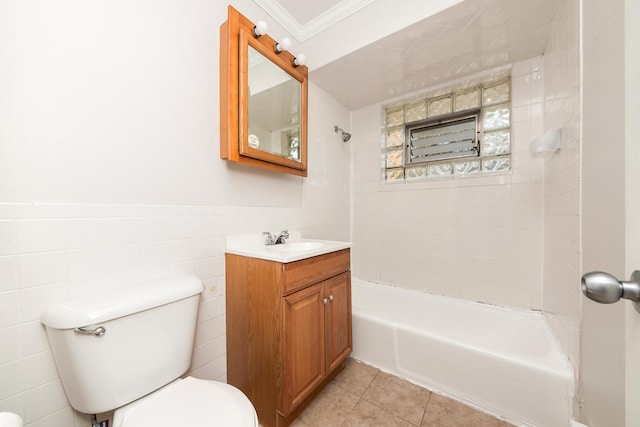 full bathroom with  shower combination, ornamental molding, tile patterned floors, toilet, and tile walls