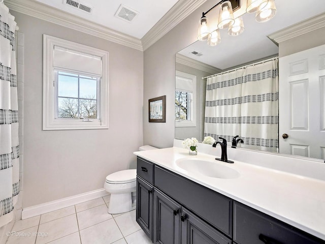 bathroom featuring visible vents, a healthy amount of sunlight, and ornamental molding