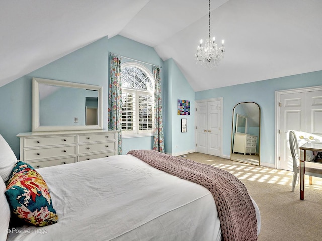 bedroom with vaulted ceiling, carpet, baseboards, and a chandelier