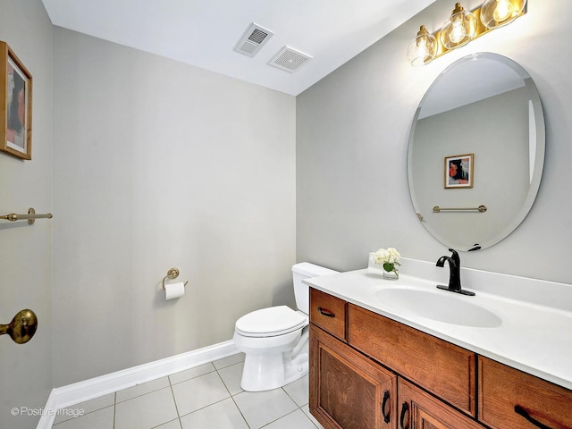 bathroom with tile patterned floors, visible vents, toilet, and vanity