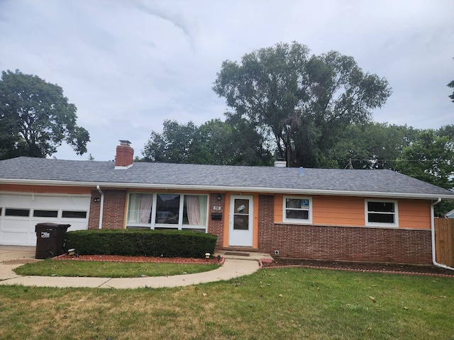 ranch-style house featuring an attached garage, brick siding, driveway, a chimney, and a front yard