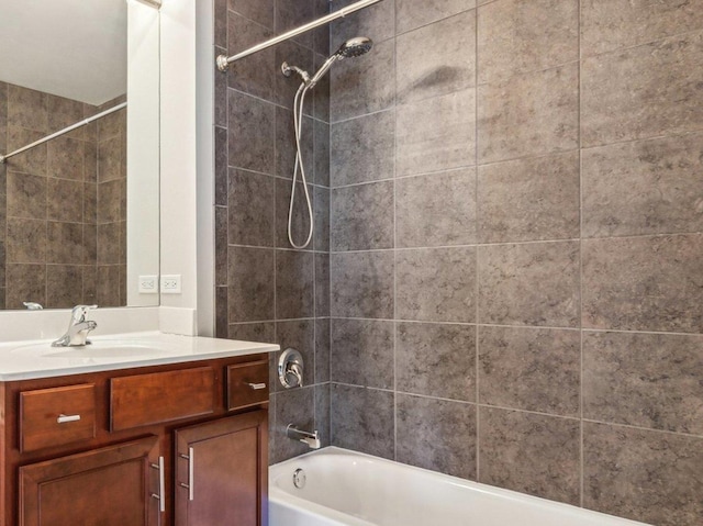 bathroom with vanity and shower / tub combination