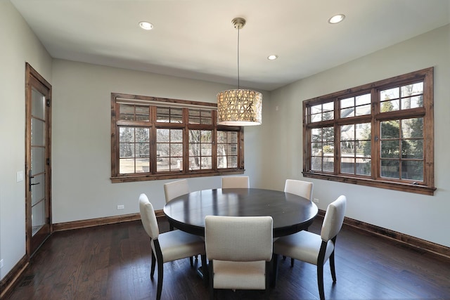 dining room with recessed lighting, visible vents, baseboards, and dark wood finished floors