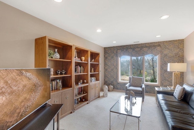 living area with recessed lighting and carpet flooring