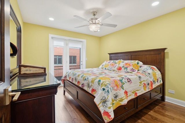 bedroom with access to exterior, dark wood-type flooring, ceiling fan, baseboards, and recessed lighting