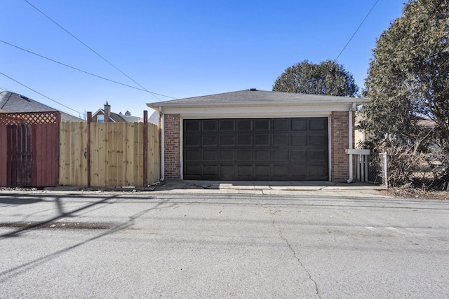 detached garage with fence