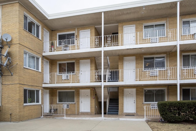 view of building exterior with stairs