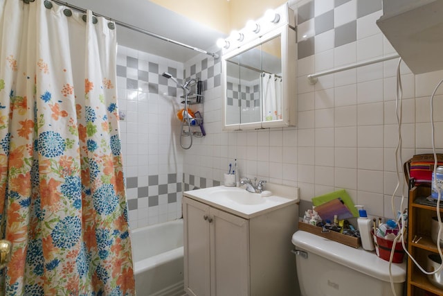 bathroom featuring backsplash, toilet, vanity, shower / bath combination with curtain, and tile walls