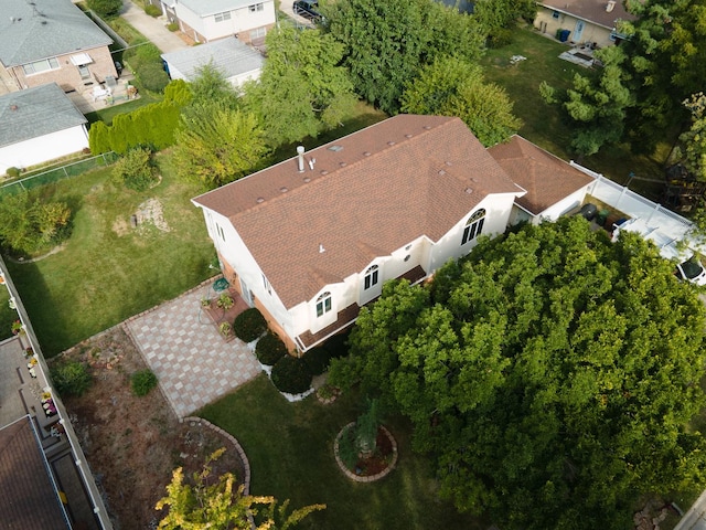 birds eye view of property with a residential view