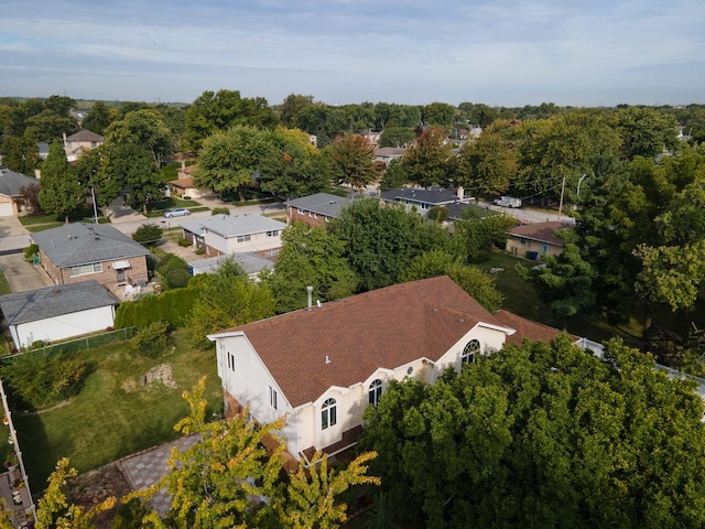 birds eye view of property with a residential view