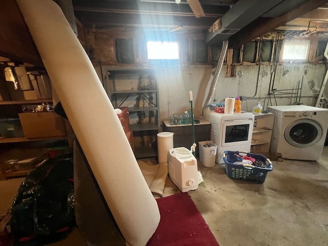 basement featuring washing machine and clothes dryer