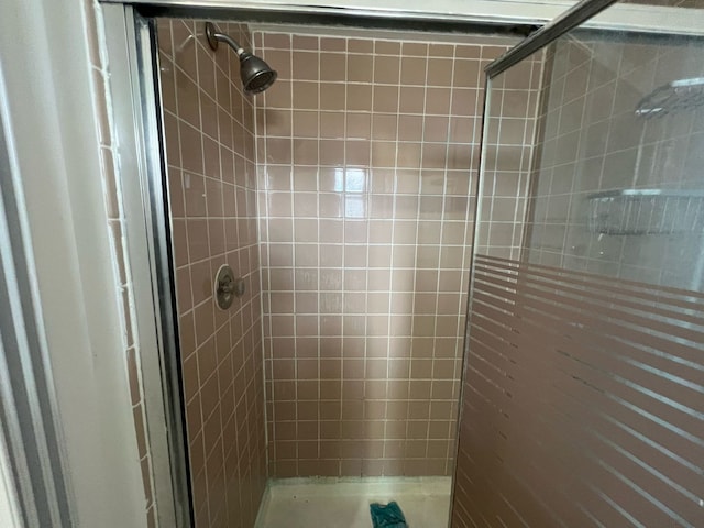 full bathroom with a stall shower